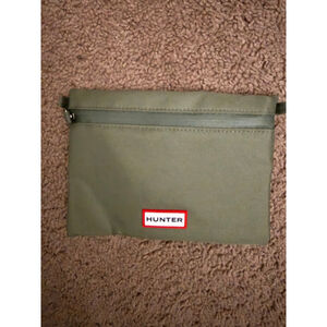Women's Hunter Green travel pouch .